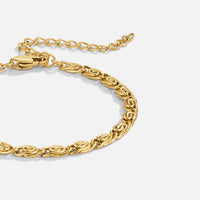 Gold Swirl Link Chain Bracelet